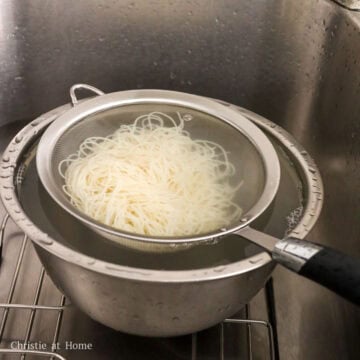 rinse noodles with cold water to remove excess starch