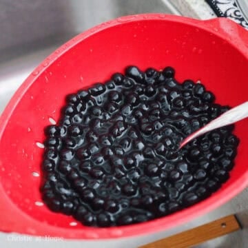Strain the cooked bobas in a colander and rinse them off with cold running water. Strain out excess water and set aside.