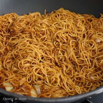 Pour noodle sauce and toss until noodles are evenly coated.