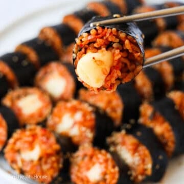 Optional: if you want extra melted cheese, microwave each kimbap roll for 15-20 seconds.