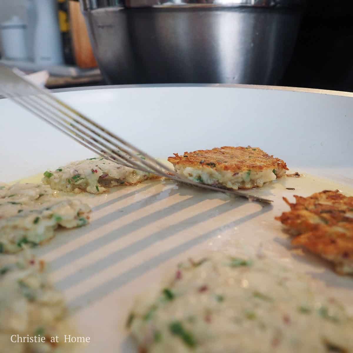 Heat vegetable oil in a large non-stick pan on medium heat. To make each pancake, add 3 tbsps of pancake mixture into pan and flatten it out with spatula. Repeat this until there is no more potato mixture left. Fry the potato pancakes on each side until golden brown, about 5-7 minutes in total. Drain the latkes on a paper towel lined plate or wire rack to remove excess oil. Serve with sour cream and enjoy!