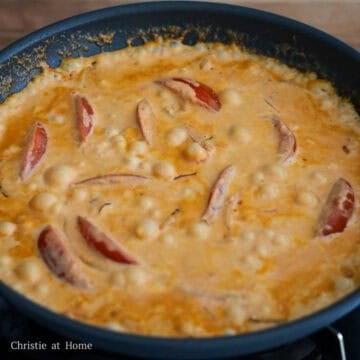 Add marinara sauce and heavy cream and mix until combined. Let the sauce naturally come to a boil on medium heat to slightly thicken.
