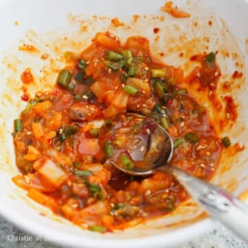 Sauce ingredients mixed in a small bowl into a glossy, seasoned mixture.