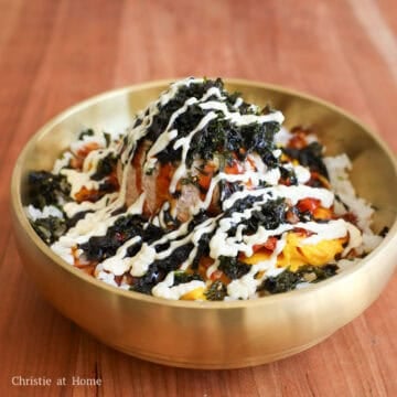Finally garnish with roasted seaweed flakes on top. Drizzle mayonnaise and teriyaki sauce over the rice bowl. Enjoy!