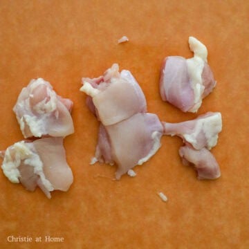 Dice the chicken thighs into 1.5-inch cubes and transfer to a large mixing bowl.