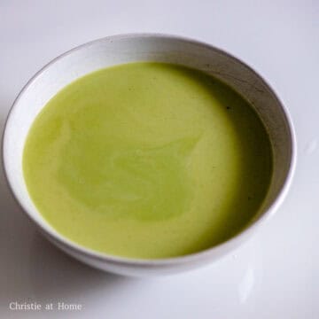 Whisk together the milk and pandan extract. Microwave for 60 seconds or heat in a small saucepan until lukewarm.