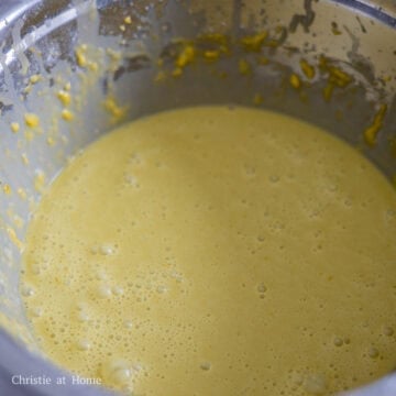 Gradually add the warm pandan milk to the egg mixture (about ¼ cup or 60 ml at a time). Mix until combined.