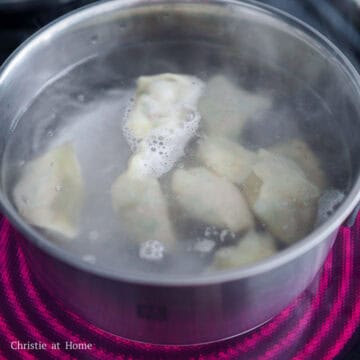 To boil wontons: bring a medium pot of water filled with 8 cups / 1.9 litres of water to boil on medium-high heat. Add wontons in small batches, reduce to medium-heat and boil for a total of 6-8 minutes or until they float to the top and are cooked through. Strain out the cooked wontons and transfer to a serving bowl.