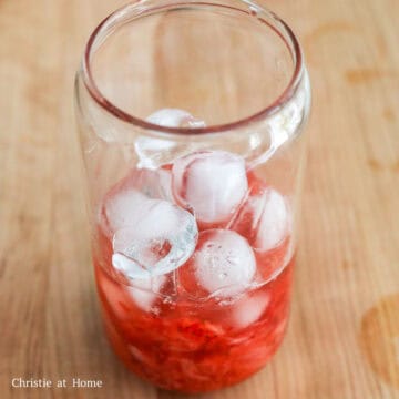 Optional: add ice cubes on top of the strawberry purée if you want it colder.