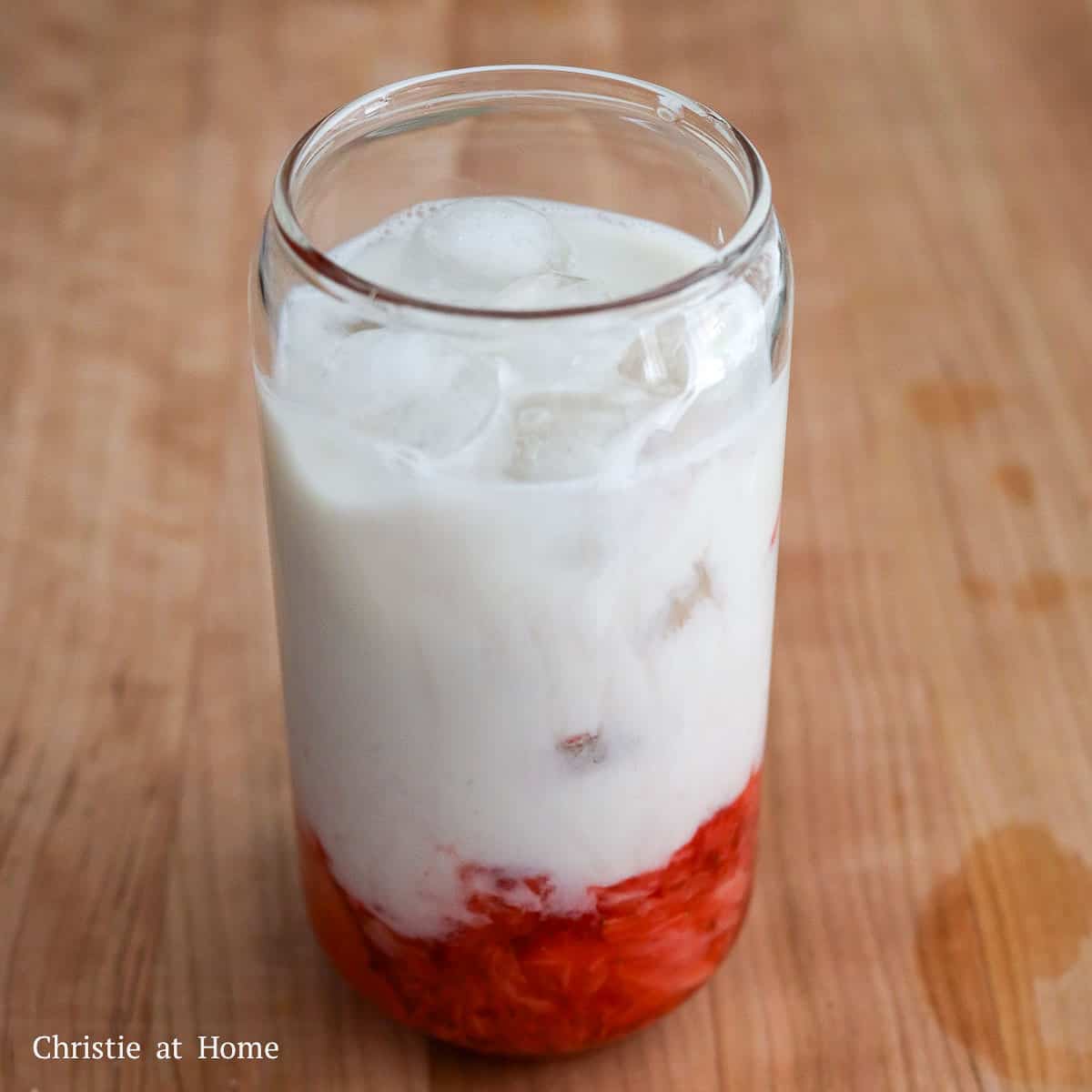 Pour cold milk over the puréed strawberry mixture and ice and mix to enjoy!