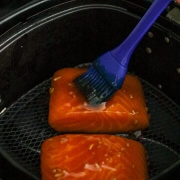 Transfer salmon to air fryer basket.