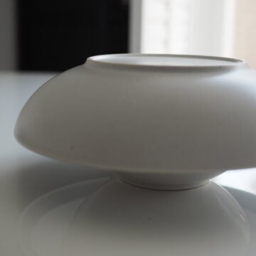 Plate two larger shallow bowls on top of each rice bowl. Let it set for 1 minute. Then flip it over and remove the first bowl.