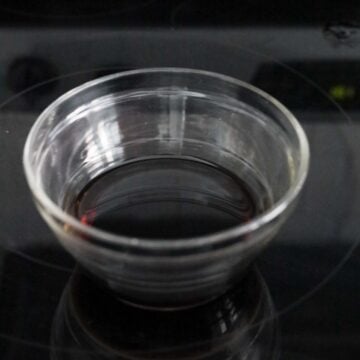 In a small bowl, combine regular soy sauce, mirin, and sake.