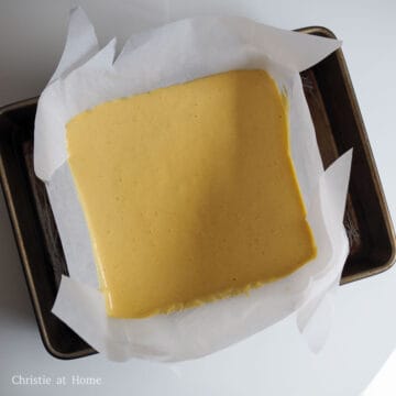 Then fill a larger baking pan filled with 70 degrees C hot water and then place the square cake pan into the larger one.
