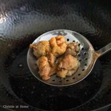 Remove fried chicken from the pan and transfer to a wire rack or a paper towel lined plate.