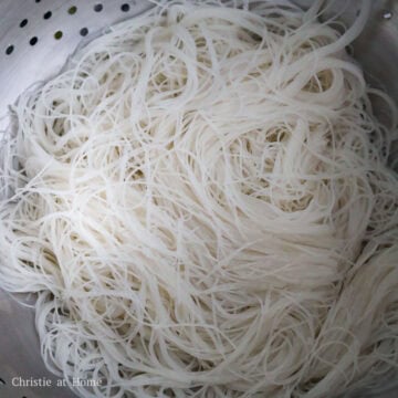 In a large bowl, soak vermicelli rice noodles in hot boiling water for 1-2 minutes max until noodles are loosened, limp and slightly softened. Strain immediately and rinse under cold water to remove excess water. Shake out any excess liquids.