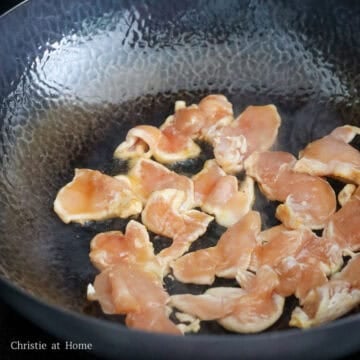 In a large pan set over medium high heat, add oi and fry chicken until 75% cooked.