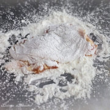 Evenly coat the chicken thighs with cornstarch on both sides, shaking off any excess. Set aside on a large plate lined with parchment paper.