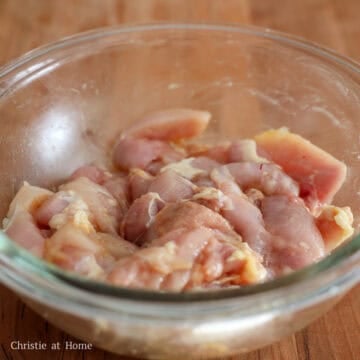 In a large bowl, season the sliced chicken thighs with oyster sauce and set aside.