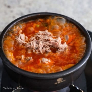 Then mix in green onions and add strained tuna.