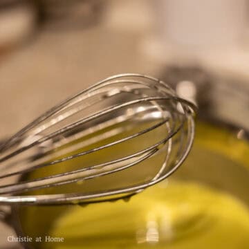 When chunks begin to form as you stir, remove the pot off heat. Next stir the mixture well until the chunks have dissolved completely. Cover to keep warm.