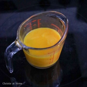 In a small bowl or measuring cup with a lip, combine the cornstarch and cold water and mix until dissolved. Then crack the eggs into the same bowl and add vegetable oil and chicken bouillon. Beat egg mixture for at least 30 seconds until very smooth.