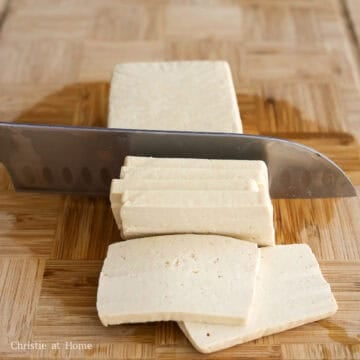 Slice tofu into 1-cm or ½-inch-thick rectangles and set aside. The thickness of the tofu slices is based on personal preference.