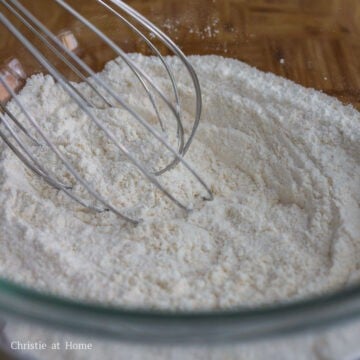 whisk all-purpose flour, potato starch, baking powder, garlic powder, onion powder, chicken bouillon powder and salt until combined.