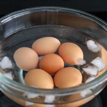 transfer boiled eggs to ice bath