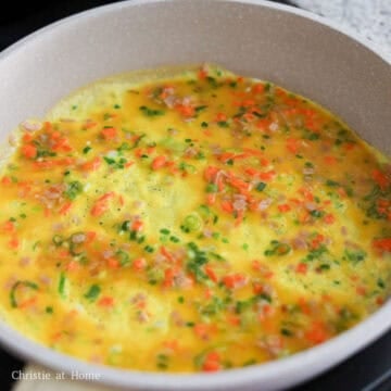 Lightly grease the pan and on low heat pour a thin layer to create a pancake