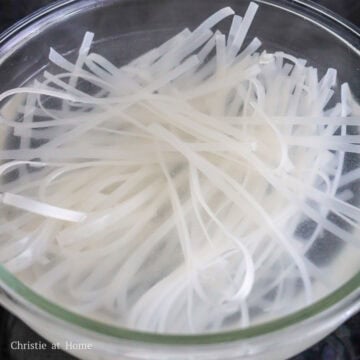 Soak your rice noodles in hot boiling water for 2 minutes until limp but firm and strain. Set aside. Do not over soak the noodles!