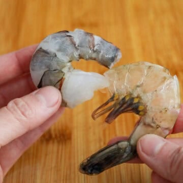 Peel deveined shrimp leaving the tails on.