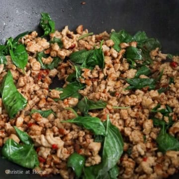 Add basil leaves and stir-fry for 15 seconds.