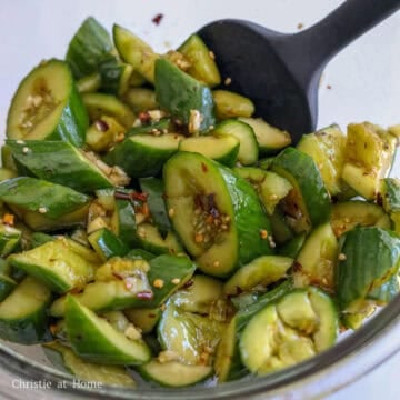 Add the dressing ingredients as listed above to the cucumbers and mix well. Enjoy!