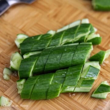 Then chop the cucumbers on an angle into ¾-inch wide strips.