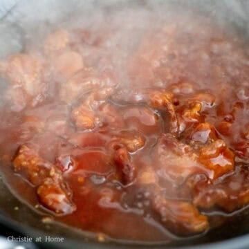 Once the sauce has thickened, toss in the fried pork until the pork is evenly coated in the sauce.