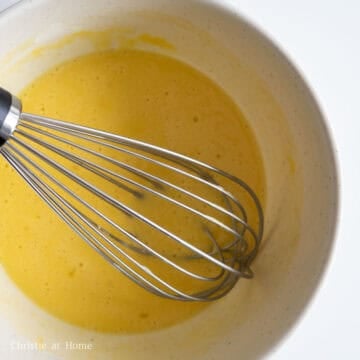 In a large mixing bowl, whisk together your batter ingredients until well combined. In another bowl, mix your sweet and sour sauce until well combined and set aside.