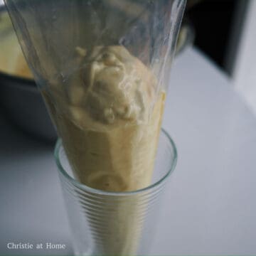 Optional: Quickly transfer pancake batter to a piping bag rested in a tall glass. This helps you create tall fluffy pancakes but if you don't have piping bags, skip this step.