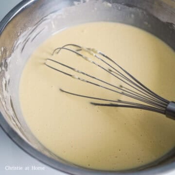 To make the bread batter: whisk together all-purpose flour, white granulated sugar and baking powder until combined in a large mixing bowl. Then whisk in the egg, vanilla extract, milk and melted butter and mix just until combined. Do not over mix.