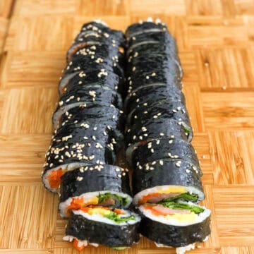 Lastly, brush sesame oil onto the sides of a sharp knife and slice kimbap into ¾-inch thick pieces. Enjoy immediately or at room temperature.