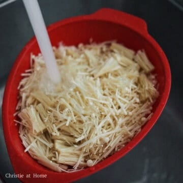 Give mushroom pieces a thorough rinse with cold running water to remove any odor or dirt and shake out as much excess water as possible. Pat super dry with clean paper towels to prevent soggy pancakes.