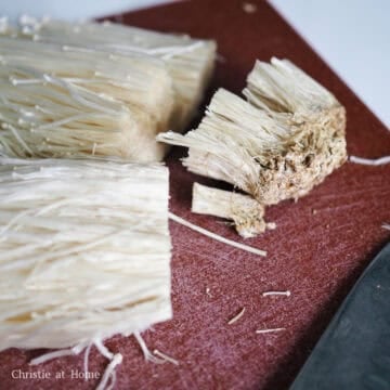 Trim the ends of the mushrooms off, about 1.5 inches where you see the dirt.