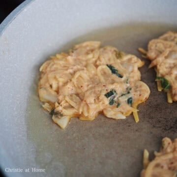 In a large pan on medium heat, add 2 tablespoon vegetable oil. Spoon about ¼ cup of the batter into the hot pan. Flatten batter into a thin pancake using the flat side of your measuring cup. Do not overcrowd the pan and fry the pancakes in small batches depending on the size of your pan.