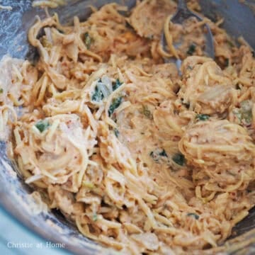 Place the grated potatoes in a large mixing bowl, along with all-purpose flour, egg and chopped kimchi. Mix thoroughly until ingredients are well combined and the batter is sticky.