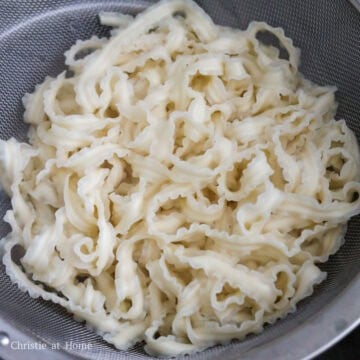 In a medium pot of water, bring to a boil on medium-high heat. Boil ribbon wheat noodles for 3-5 minutes until al dente. Strain immediately and do not rinse off with cold water.