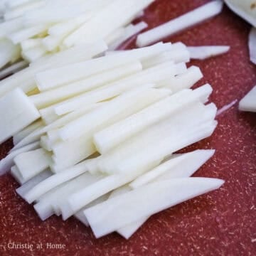 Thinly slice peeled potatoes into ½-cm thick pieces that are about 2-inches long. This ensures a faster cooking process.