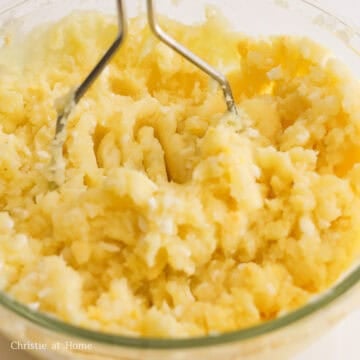 Strain and rinse potatoes under cold water to bring them to room temperature. Strain out as much excess water as possible. Add cooked potatoes to the same bowl with the eggs. With a potato masher, mash potatoes and eggs until creamy and fluffy.