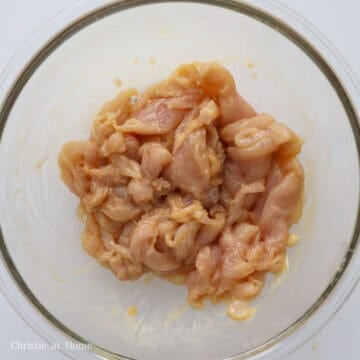 In a medium sized bowl with sliced chicken breast, add marinade ingredients as listed above and mix well. Set aside and marinate for 15 minutes at room temperature.