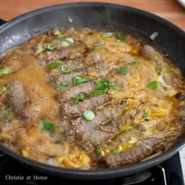 Pour the beaten eggs in a circular motion over the beef rolls and cook for another 1-2 minutes or until your desired consistency. Garnish with green onions and sesame seeds. Enjoy hot with steamed rice.Â