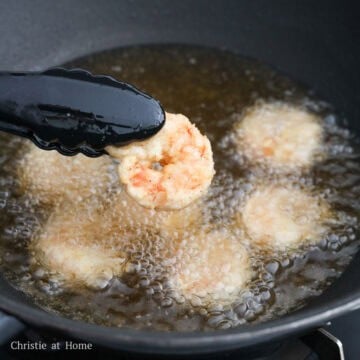 Heat vegetable oil in a large pan to 350 degrees F, around medium heat. Fry 6 pieces of shrimp at a time until golden and crispy or 2 minutes in total, flipping over halfway. Do not overcrowd the pan.